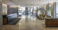 a lobby of a building with a large wheel at CityInn Hotel Plus- Fuxing North Road Branch in Taipei