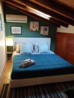 Posteľ alebo postele v izbe v ubytovaní Petite Maison dell'Etna