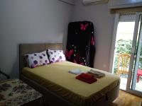 Postel nebo postele na pokoji v ubytování flower apartment-Hilton-US embassy