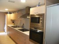 Kuchyň nebo kuchyňský kout v ubytování Athenea - Apartamentos