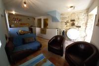 a living room with a couch and two chairs at Charming Village Getaway in Bonnieux in Bonnieux