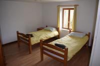 Ein Bett oder Betten in einem Zimmer der Unterkunft Chambre d&#39;h&ocirc;tes de puy faucher