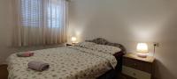 Postel nebo postele na pokoji v ubytování Apartments Bresina