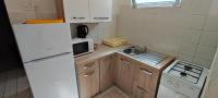 Kuchyň nebo kuchyňský kout v ubytování Apartments Bresina