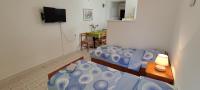 Postel nebo postele na pokoji v ubytování Apartments Bresina