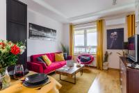 Televízia a/alebo spoločenská miestnosť v ubytovaní Lumina apart with balcony Platinum Tower