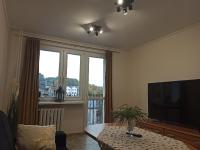 Televízia a/alebo spoločenská miestnosť v ubytovaní APARTAMENT CENTRUM Międzychód