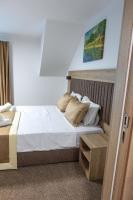 Postel nebo postele na pokoji v ubytování Evelin Deluxe House