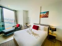 Postel nebo postele na pokoji v ubytování Edge Central Pattaya Vip Condo