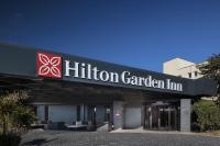 a building with a hilinson garden inn sign on it at Hilton Garden Inn Marseille Provence Airport in Marignane