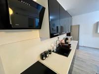 Kuchnia lub aneks kuchenny w obiekcie Apartment Rosnička, Perfect Location with 24h Checkin, Balcony, AC & Free Parking