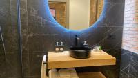 Koupelna v ubytování SUITE HAUS BAHIA