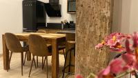 Kuchyň nebo kuchyňský kout v ubytování SUITE HAUS BAHIA