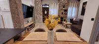 TV a/nebo společenská místnost v ubytování SUITE HAUS BAHIA