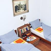 Postel nebo postele na pokoji v ubytování Ayki - historic centre apartment