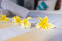 Suite Home Boutique Hotelにあるベッド