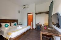 Suite Home Boutique Hotelにあるベッド
