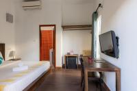 Suite Home Boutique Hotelにあるテレビまたはエンターテインメントセンター