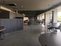 an empty room with tables and chairs and tables at Senpokaku in Toba