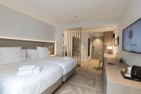 Posteľ alebo postele v izbe v ubytovaní Hotel Encinar de Sotogrande