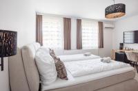 Posteľ alebo postele v izbe v ubytovaní Casa Plus