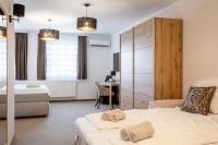Posteľ alebo postele v izbe v ubytovaní Casa Plus