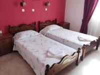 Łóżko lub łóżka w pokoju w obiekcie Corfu Villa Memos