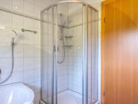 a bathroom with a shower and a toilet at Obinghof in Söll