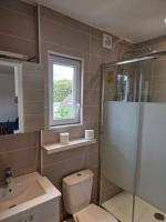 Łazienka w obiekcie Spacieux et lumineux Appartement