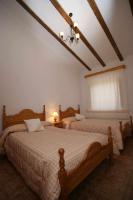 Postel nebo postele na pokoji v ubytování Casa rural El Salero Moratalla piscina y chimenea
