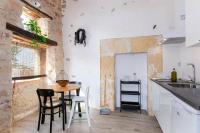 Kuchyňa alebo kuchynka v ubytovaní Cal Tio 1 Agroturismo YourHouse