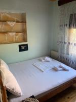 Posteľ alebo postele v izbe v ubytovaní BACI HOUSE