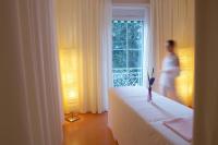 Łóżko lub łóżka w pokoju w obiekcie Alpine Spa Hotel Haus Hirt