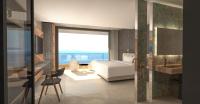 a bedroom with a bed and a large window at Villa Urbana in Porticcio
