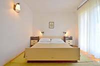 Posteľ alebo postele v izbe v ubytovaní Apartment Božiković - Jelsa - Vitarnja