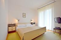 Posteľ alebo postele v izbe v ubytovaní Apartment Božiković - Jelsa - Vitarnja