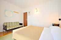 Posteľ alebo postele v izbe v ubytovaní Apartment Božiković - Jelsa - Vitarnja