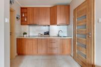 Kuchyňa alebo kuchynka v ubytovaní Flatbook - City Center SPA Apartments Toruńska