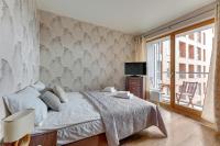Posteľ alebo postele v izbe v ubytovaní Flatbook - City Center SPA Apartments Toruńska