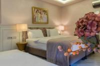 Cama o camas de una habitaci&oacute;n en Ayramin Hotel Taksim