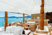 a restaurant with a view of the ocean at Zazen Boutique Resort & Spa in Bophut 