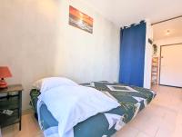 Łóżko lub łóżka w pokoju w obiekcie Appartement au CALME + parking