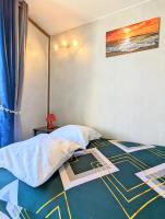 Łóżko lub łóżka w pokoju w obiekcie Appartement au CALME + parking