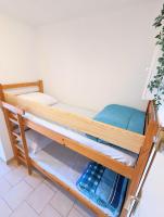 Łóżko lub łóżka w pokoju w obiekcie Appartement au CALME + parking