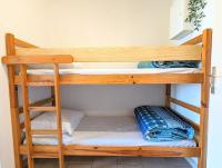 Łóżko lub łóżka w pokoju w obiekcie Appartement au CALME + parking