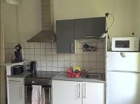 Una cocina o cocineta en Agr&eacute;able F3 - RDC (2 chambres)
