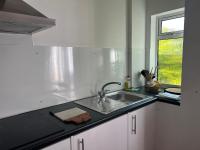 Kuchyň nebo kuchyňský kout v ubytování Byways Serviced Apartments