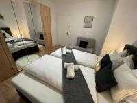 Łóżko lub łóżka w pokoju w obiekcie Appartements Slishani 2