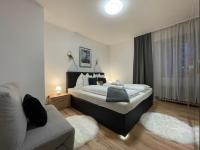 Łóżko lub łóżka w pokoju w obiekcie Appartements Slishani 2