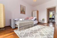 Posteľ alebo postele v izbe v ubytovaní Cozy Apartment with Balcony - Palace of Culture by Rent Like Home
